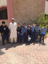 The Gardening Club with the school's gardener Jaleel